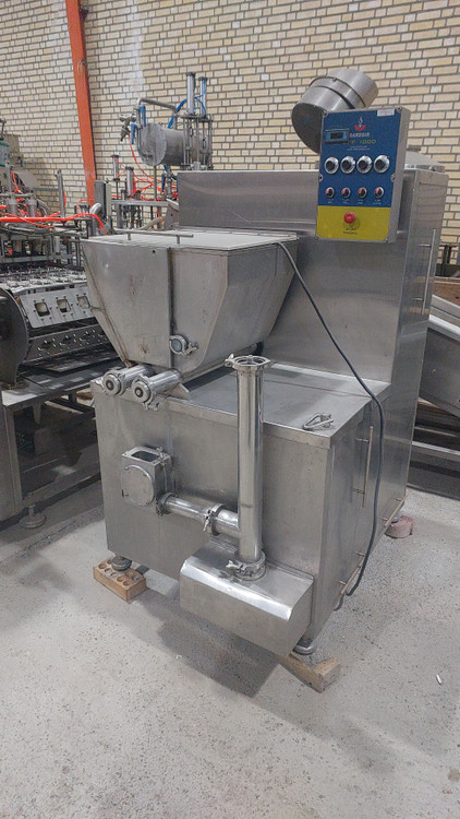 Modern ice cream production line with fruit feeder, fresh fruits and nuts being mixed into vanilla ice cream, stainless steel machinery, high-end dairy factory, photorealistic